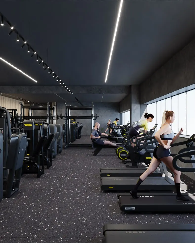 Area cardio con tapis roulant lungo le finestre